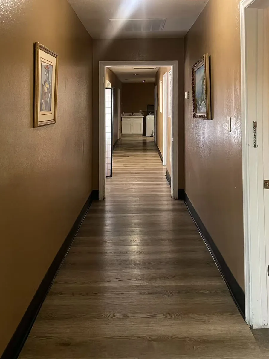 Hallway to the private rooms at Charming Spa in Moreno Valley, CA